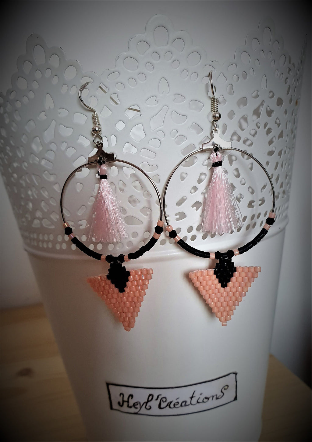 Boucle d'oreille pompon