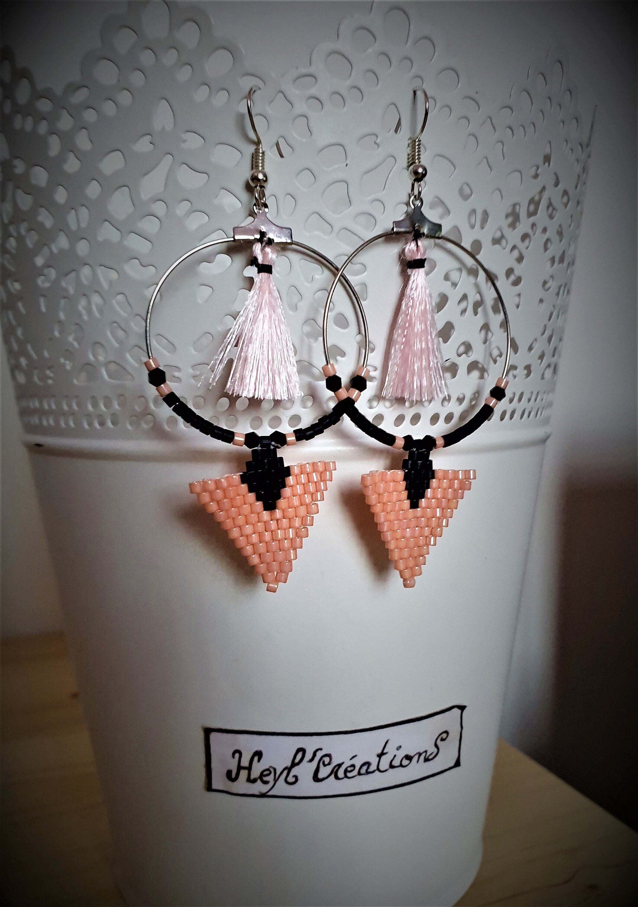 Boucle d'oreille pompon